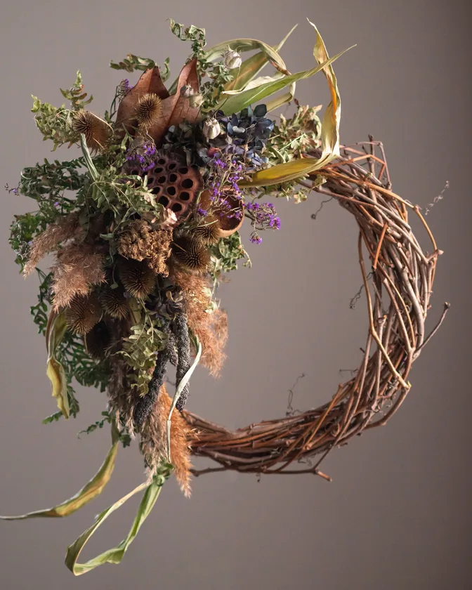 Dried flower wreath with natural grapevine and layered dried flowers