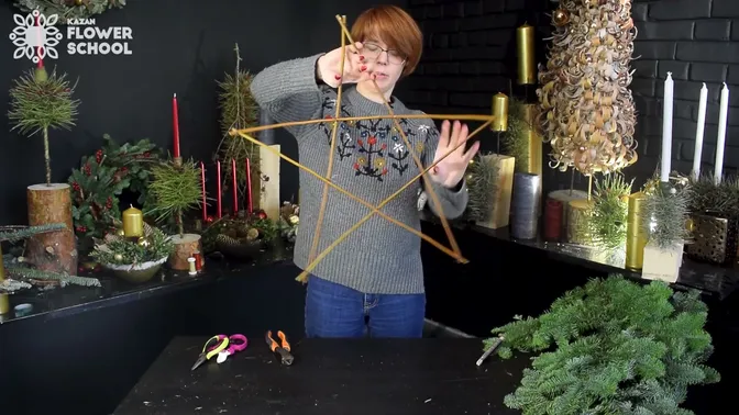 Five straight sticks joined into an open five-pointed star.