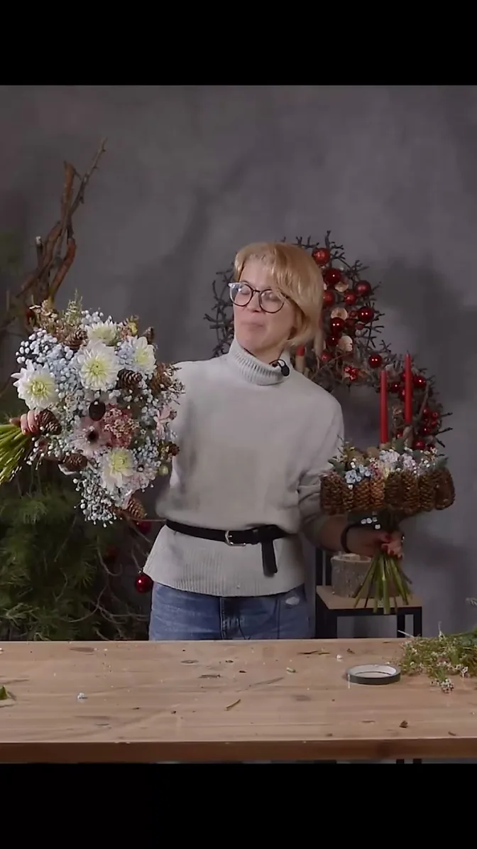Two winter bouquets held beside each other: a broad, open arrangement on the left and a compact bouquet inside an upright cone ring on the right.